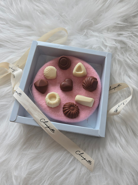 A box of chocolate Pet Beret